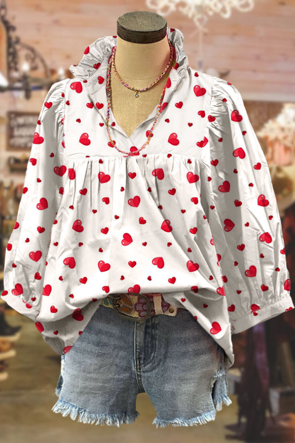 Haut classique à manches bouffantes et col en V avec imprimé cœur