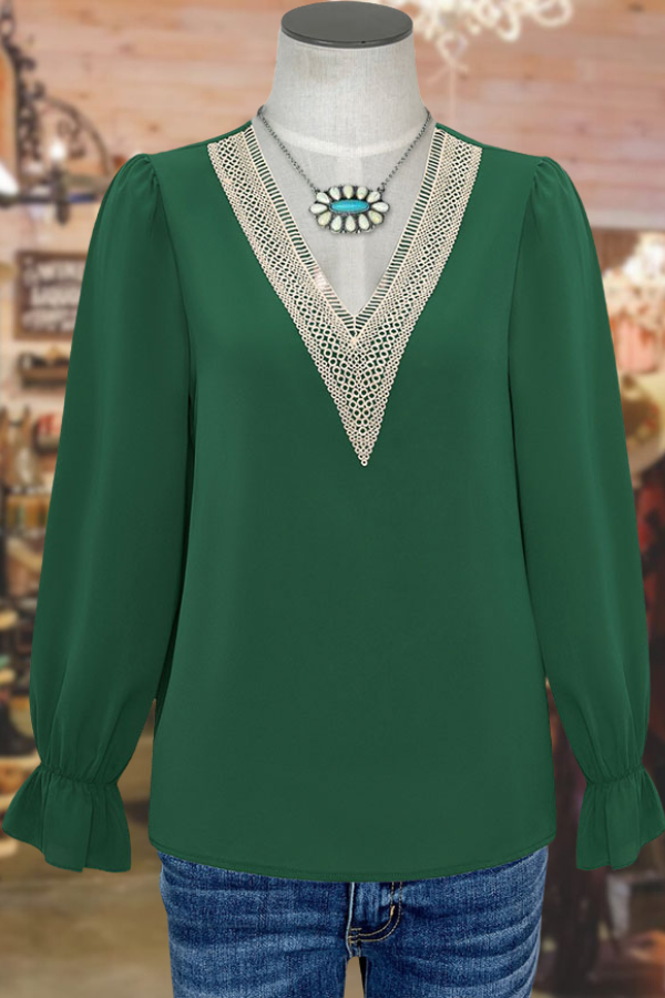 Chemisier ample en dentelle à col en V et manches cloche