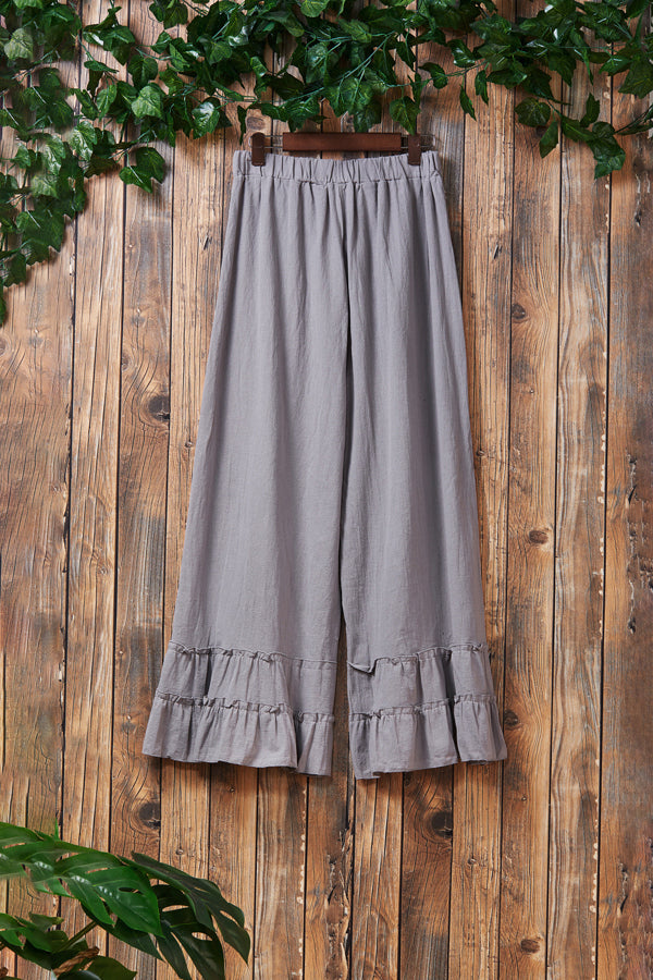 Plissierte Hose mit weitem Bein und Rüschen