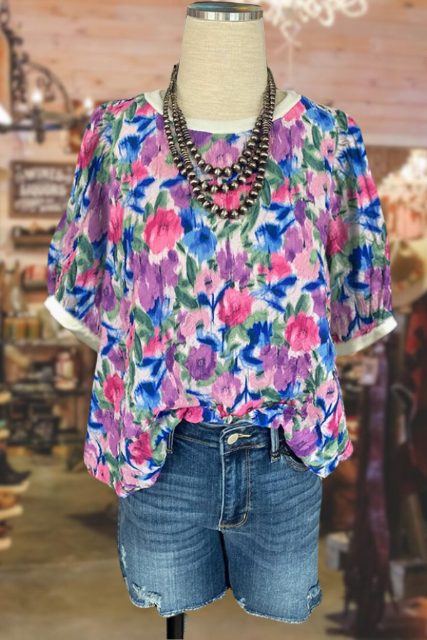 Haut à manches bouffantes et imprimé floral