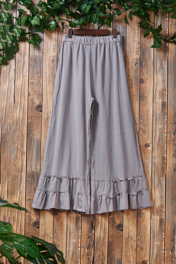 Plissierte Hose mit weitem Bein und Rüschen
