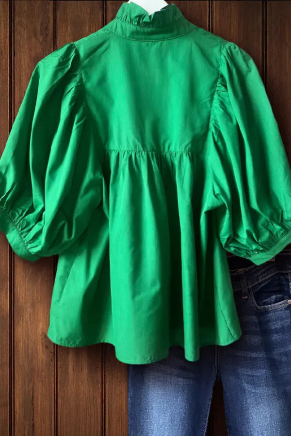 Haut à col en V et manches bouffantes