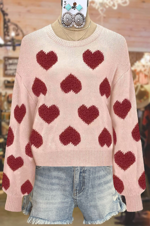 Joli pull mignon avec un cœur d'amour pour la Saint-Valentin