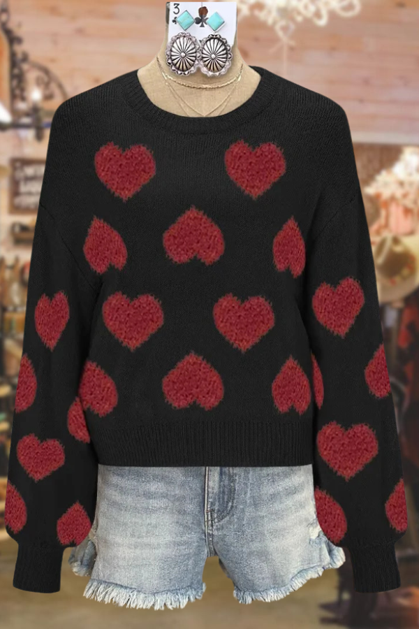 Joli pull mignon avec un cœur d'amour pour la Saint-Valentin