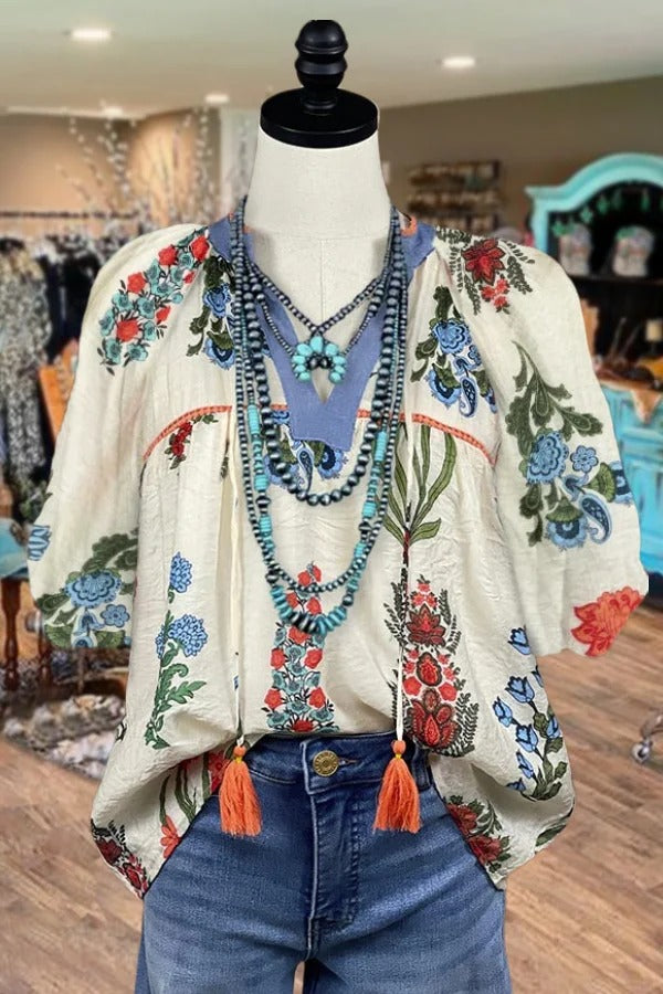 Haut à manches mi-longues et à imprimé floral avec pompons