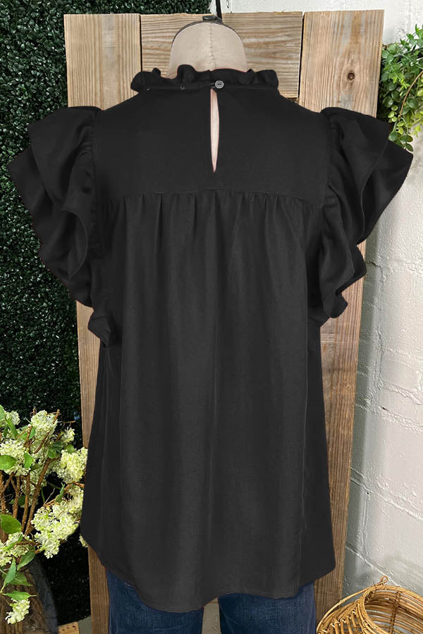 Chemise plissée à manches à double volant