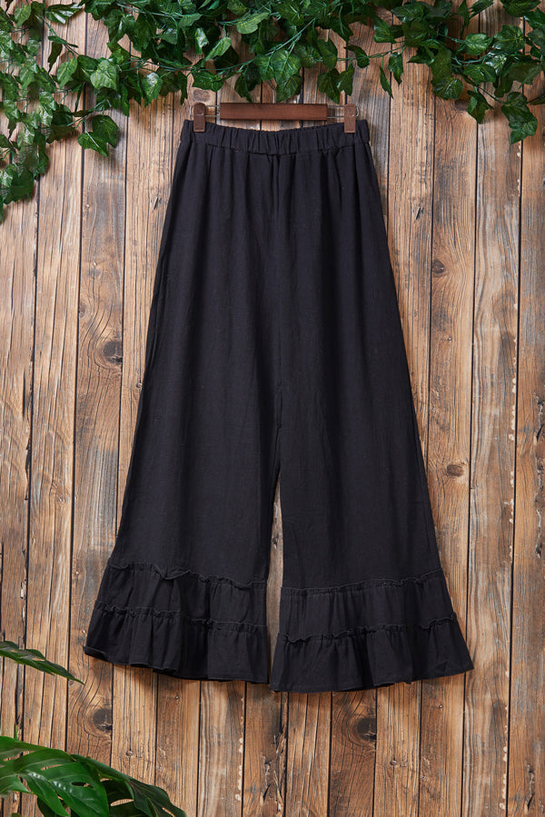 Plissierte Hose mit weitem Bein und Rüschen