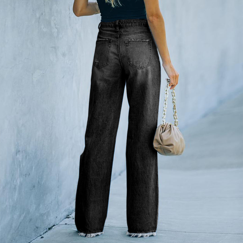 Neue lässige Jeanshose mit weitem Bein und Löchern