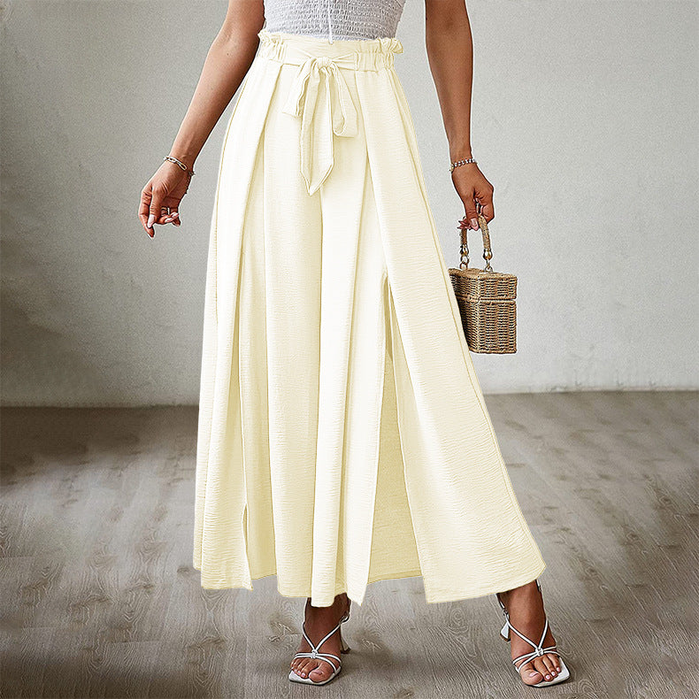 Neue lockere, hoch taillierte, plissierte Hose mit weitem Bein und Fliege