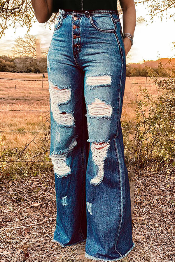 Lässige, schlichte Jeans mit weitem Bein und Rissen in verwaschener Optik