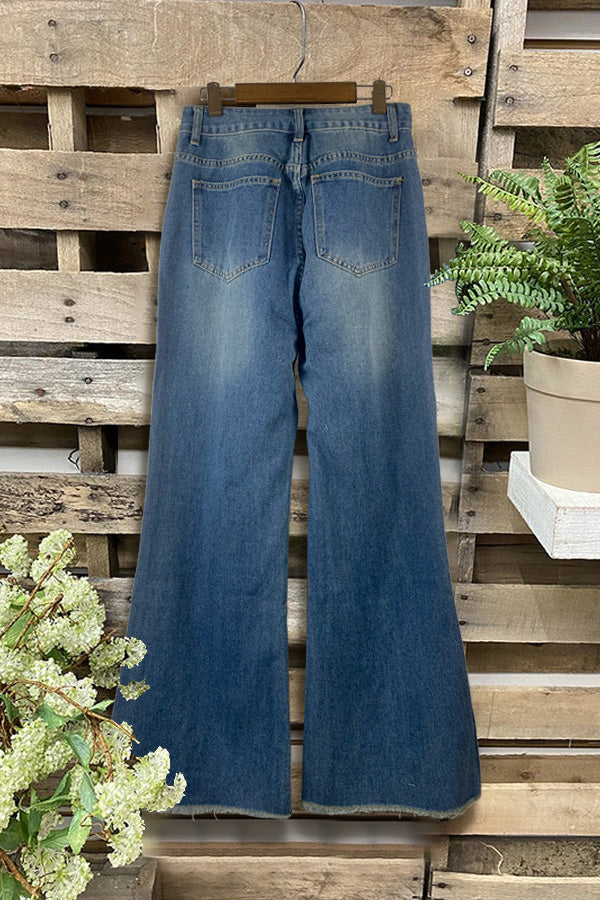 Lässige, schlichte Jeans mit weitem Bein und Rissen in verwaschener Optik