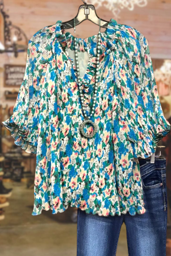 Haut à manches volantées à fleurs métallisées bleu cyan