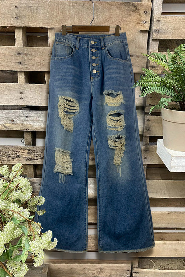 Lässige, schlichte Jeans mit weitem Bein und Rissen in verwaschener Optik