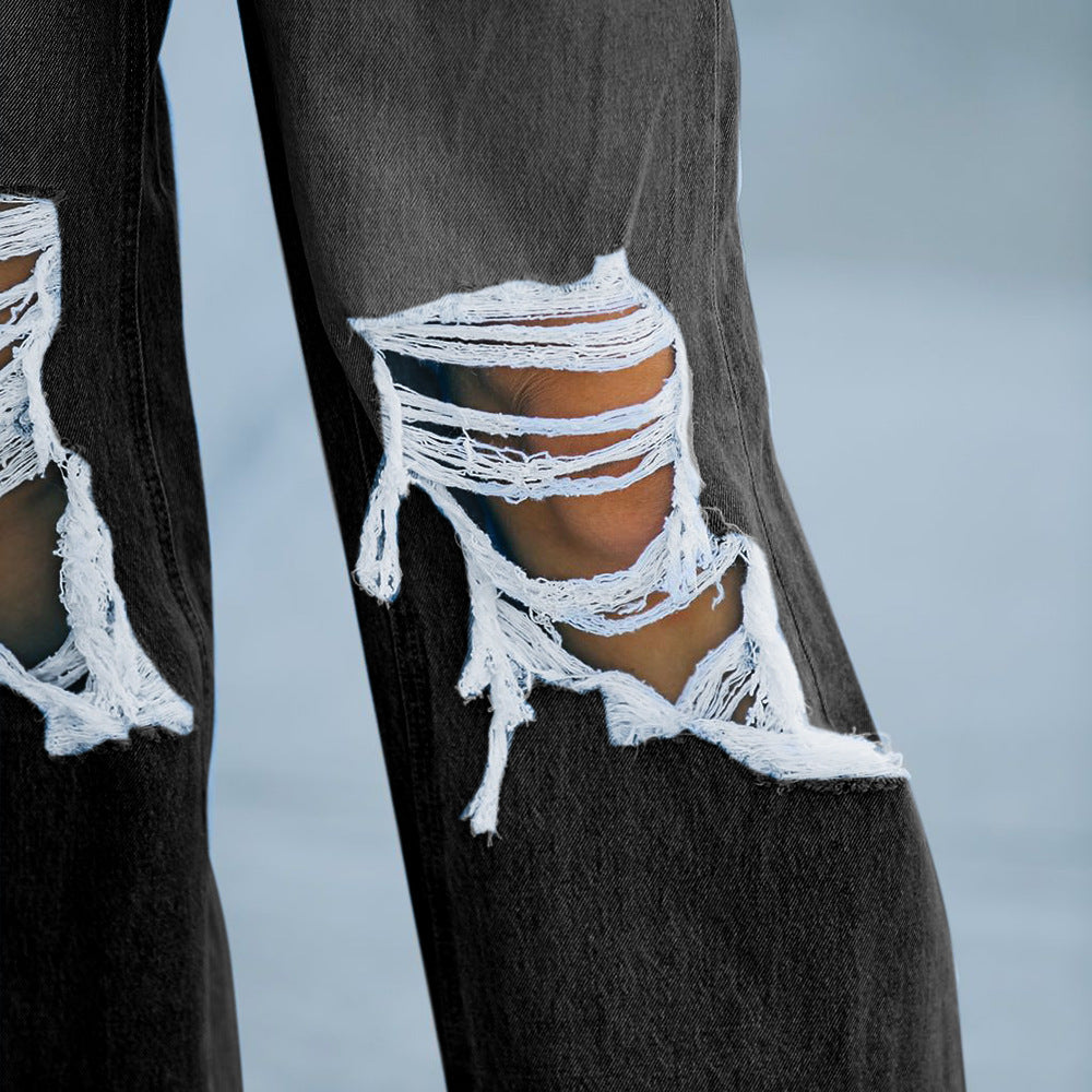 Neue lässige Jeanshose mit weitem Bein und Löchern